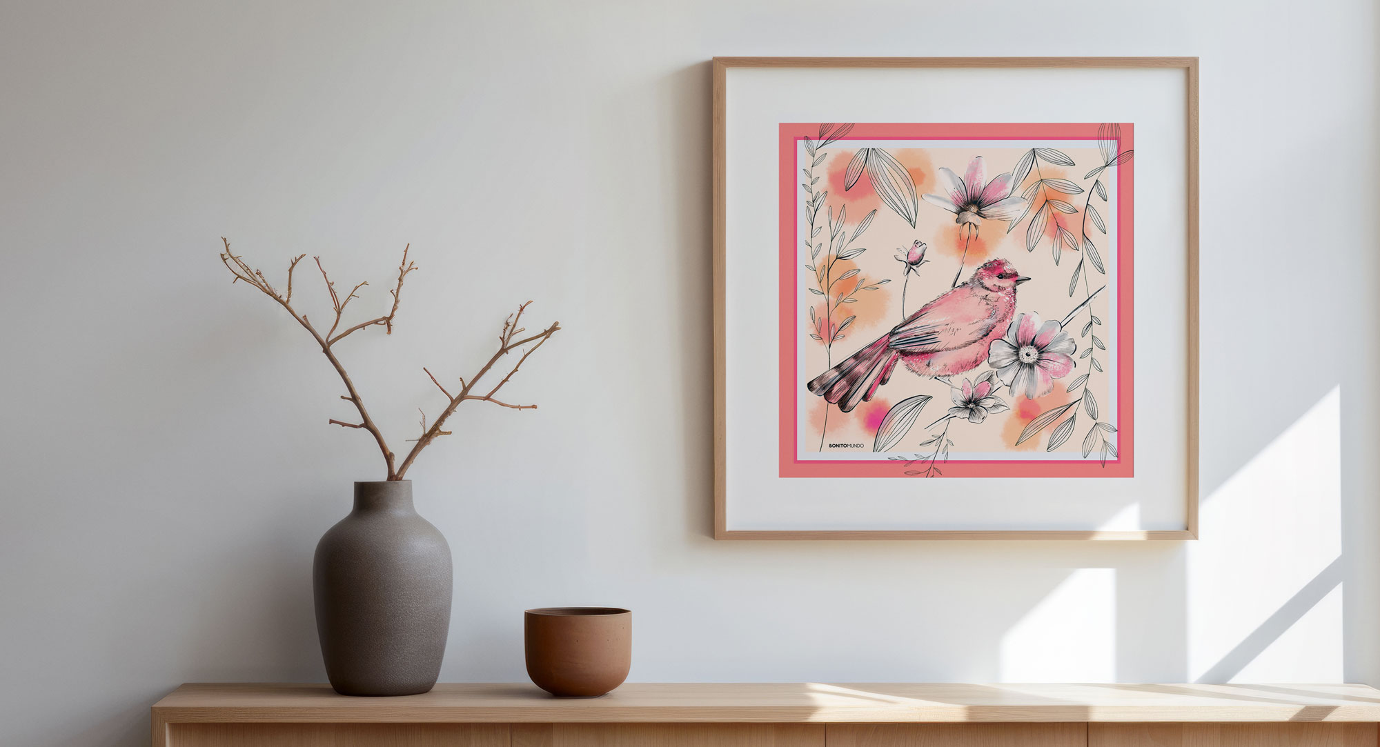 silk scarf with illustration of bird and flowers framed decorating wall