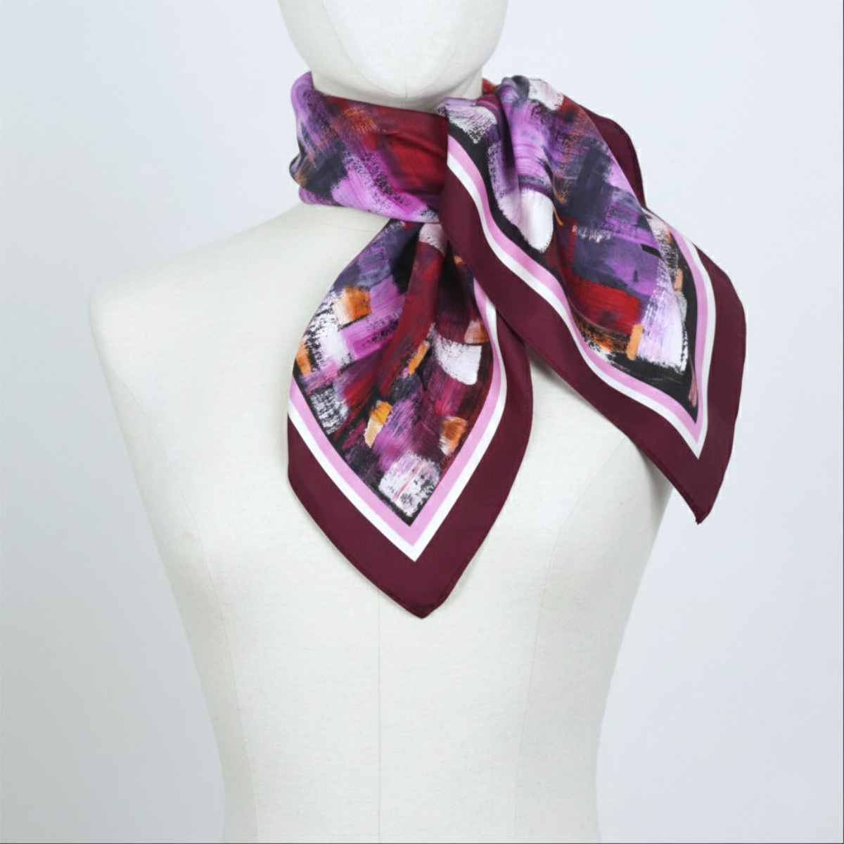 panuelo seda con arte abstracto en colores rosados y granates